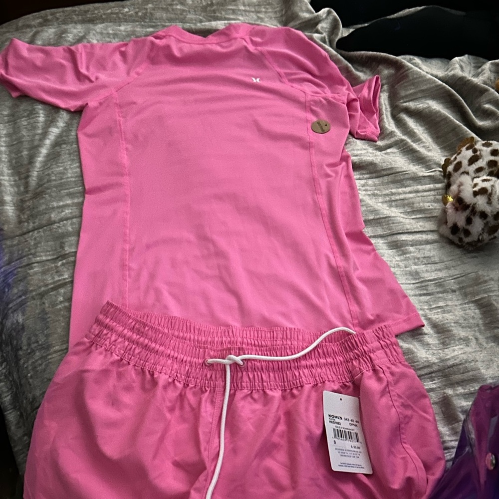 Hurley brand new with tags attached .hot pink new line just out .